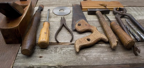 Old hand tools in a row.