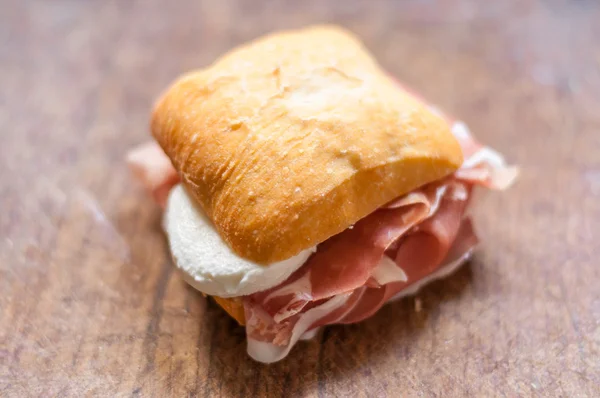 Macro of small sandwich with ham and mozzarella