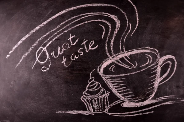 Text great teste on blackboard the  chalk painted cup of coffee
