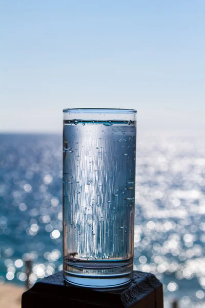 A glass of pure sparkling water.