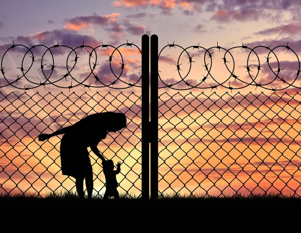 Silhouette mother with child refugees