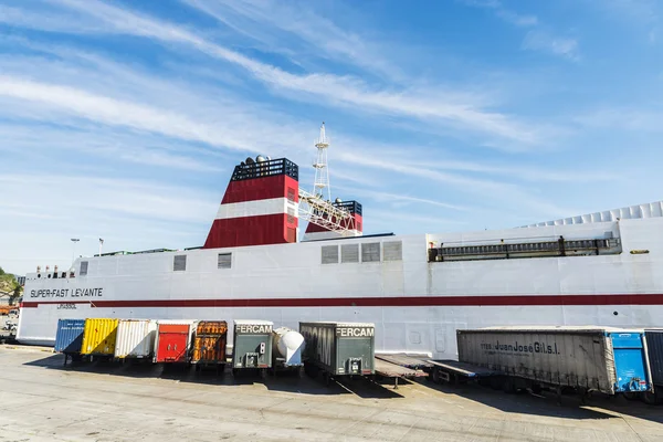 White cargo ship and containers, Barcelona