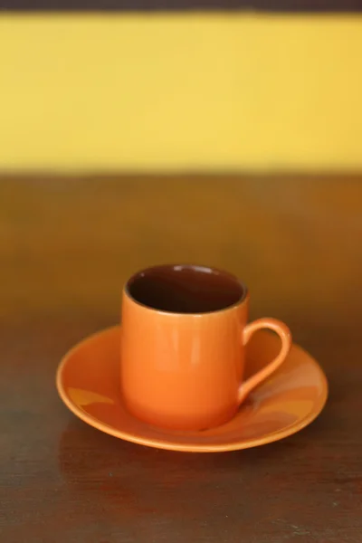 Ceramic coffee set plate at glass shop.