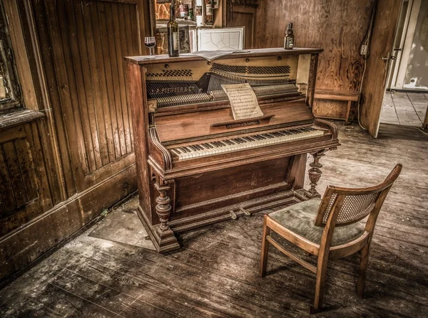 Old piano in abandoned building