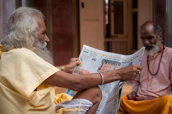 Sadhu reading paper