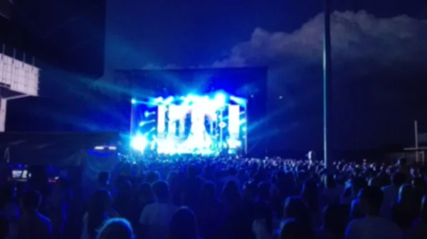 Blurred stage and concert audience