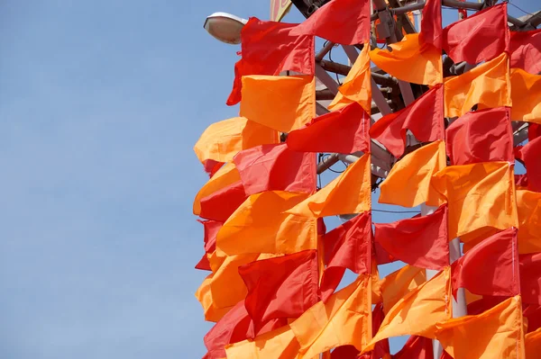 Festive flags of red and orange color