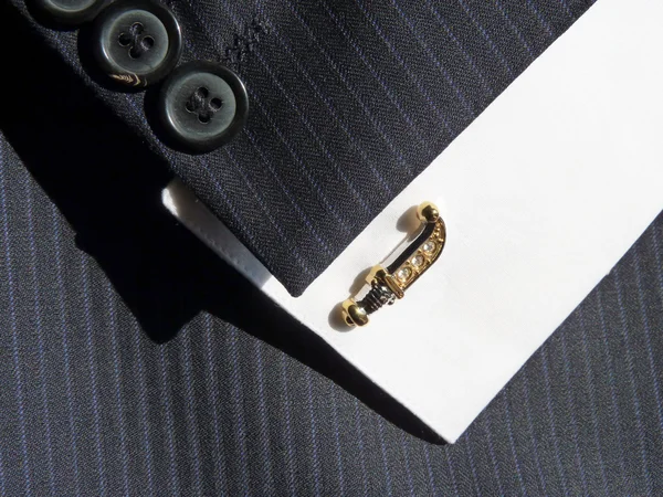 Cuff link in the form of the Ancient knife
