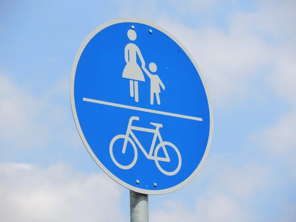 Sign of a bicycle path and a place for walking