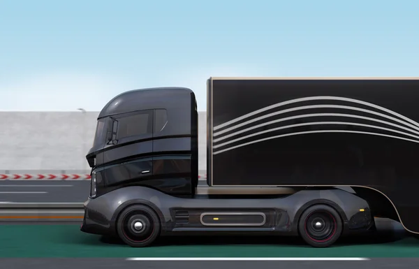 Side view of black hybrid truck on highway