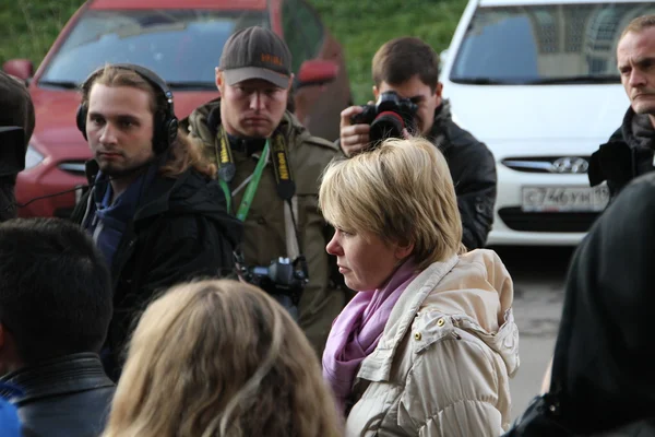 Candidate for mayor of Khimki opposition leader Evgeniya Chirikova speaks with reporters