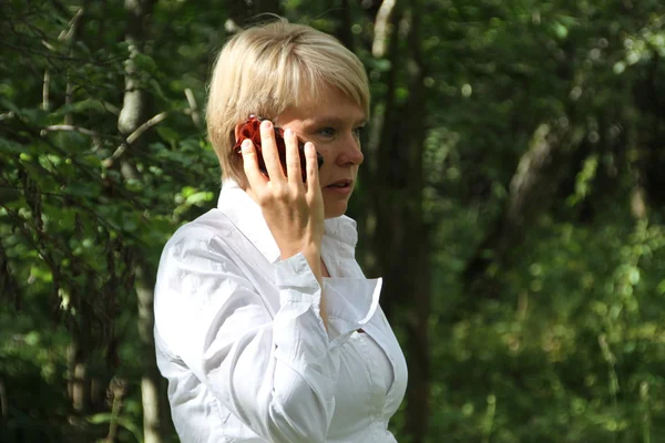 The politician she\'s been talking on the phone during a meeting of activists in Khimki forest