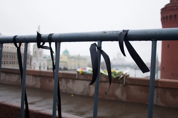 Mourning black tapes on a fencing near a place of murder of the politician Boris Nemtsov