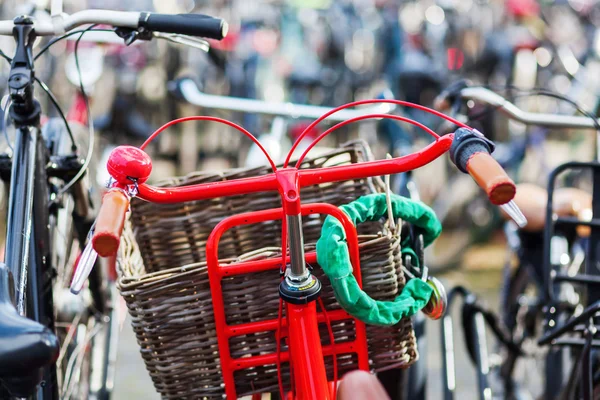 Red bicycle at a bicycle parking lot