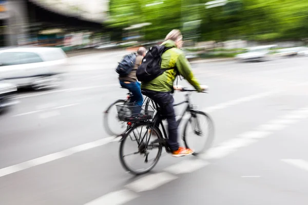 Cyclist in city traffic