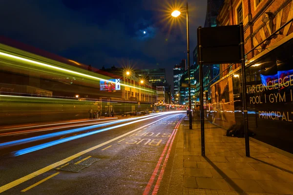 Shoreditch High Street in London, UK, at night