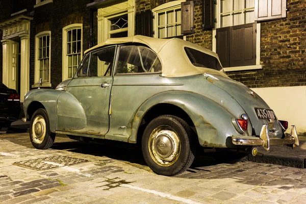 Morris Minor Convertible in a street of London car at night