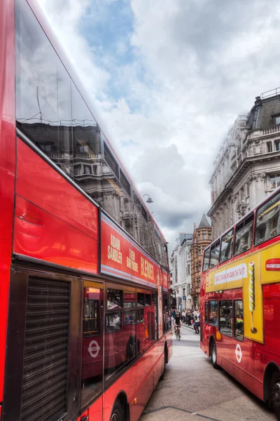 Red busses on the Oxford Circus in London, UK