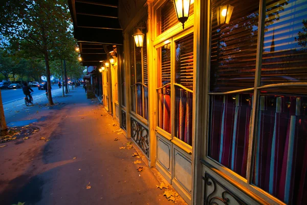Typical night street with closed shops and restaurants in Paris, France