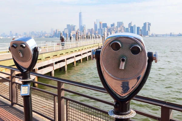 Antique binoculars on Liberty Island with view to Manhattan, NYC