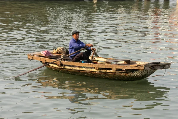 Traders in traditional boat