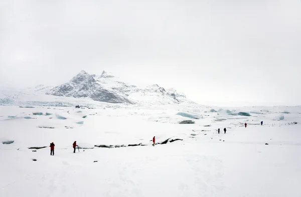 Tourists walking in Iceland