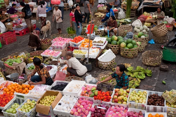 Commercial activities in a morning market in Ubud, Bali Island.