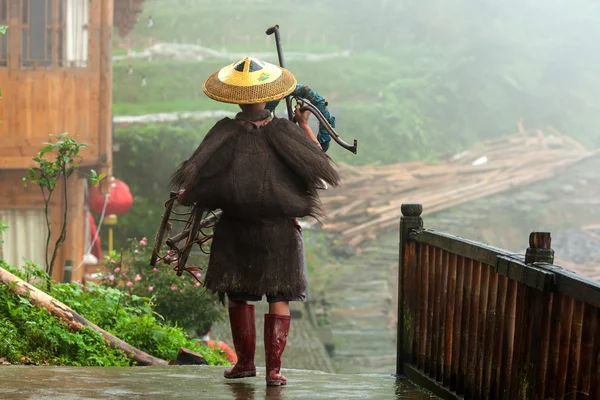 Farmer of the Yao ethnic minority tribes in Longji, China.