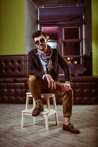 Young stylish sexy handsome model man in casual cloth lifestyle in glasses