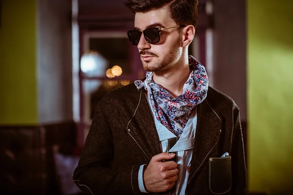 Young stylish sexy handsome model man in casual cloth lifestyle in glasses