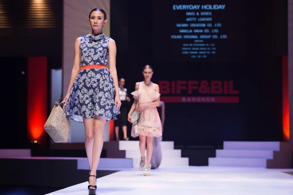 Models walks the runway at the Everyday Holiday show
