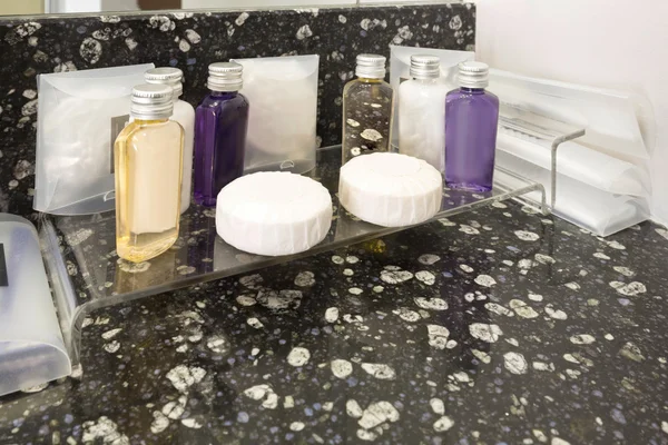 Cosmetics kit in a hotel bathroom
