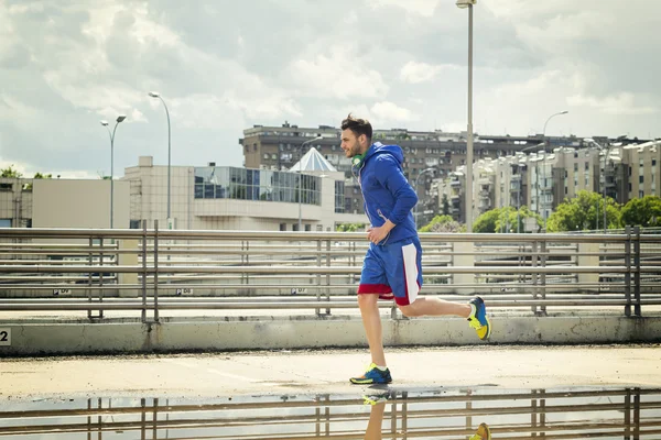 Young man jogging outdoors