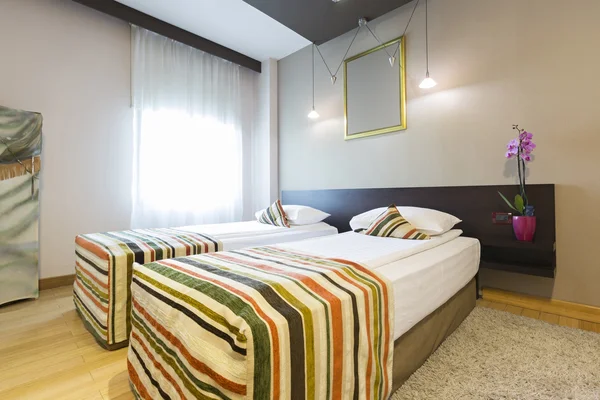 Double bed hotel room interior