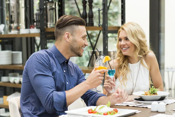 Beautiful couple on a date in restaurant