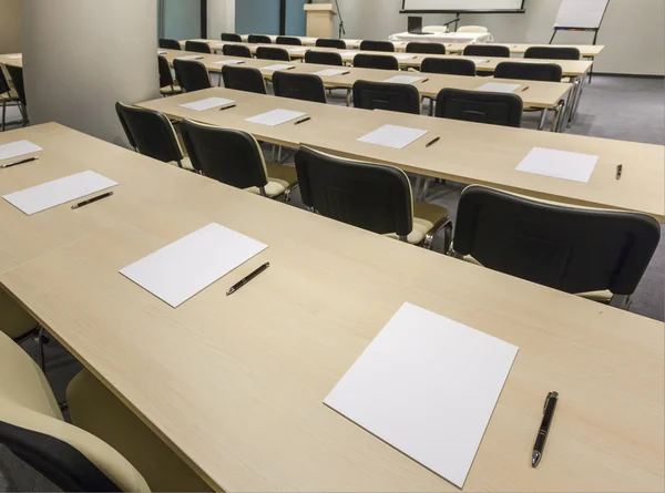 Desks in rows ready for exam