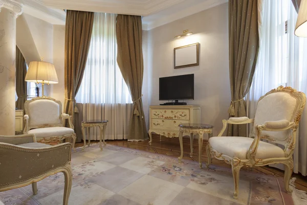 Interior of a living room with antique furniture