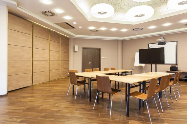Conference room interior with lcd projection screen and whiteboa