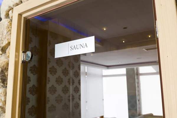 Sauna sign on the door