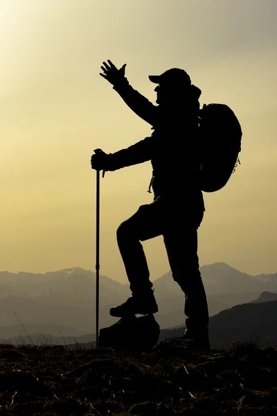 Adventurous climbers silhouette