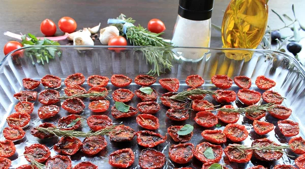 Sun-dried cherry tomatoes with spices in olive oil