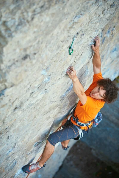 Male rock climber on the cliff