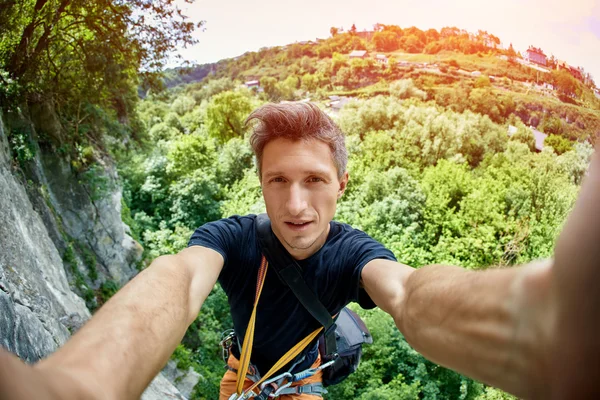 Man climber make selfie