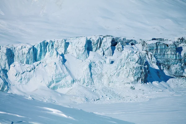 Collapsing glacier and frozen lake