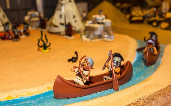 Indian canoe with two indians made by Lego blocks