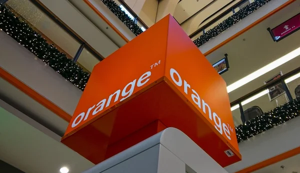 Orange mobile phone company logo in the shopping center in Polan