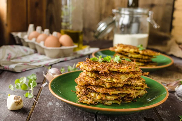 Potato pancakes with garlic and beer