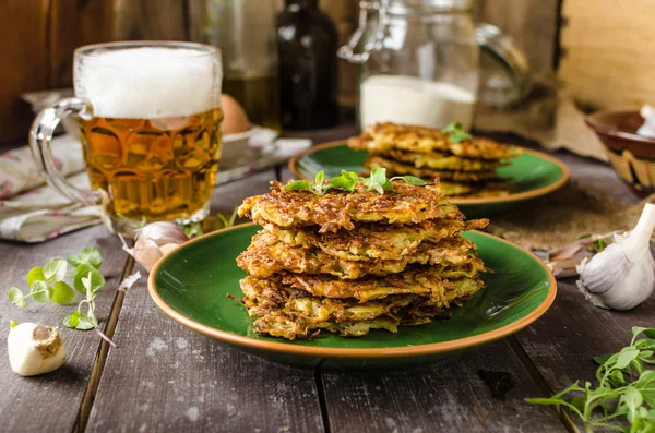 Potato pancakes with garlic and beer