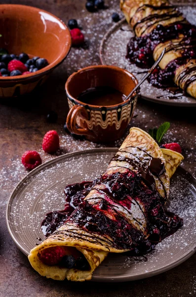 Delicious crepes with forest fruit