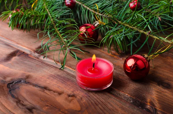Christmas candle with pine needles